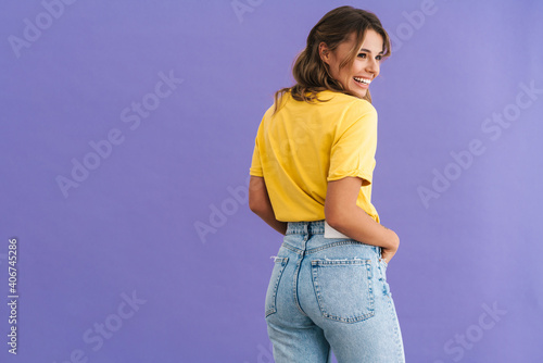 Portrait of a beautiful excited young casual woman