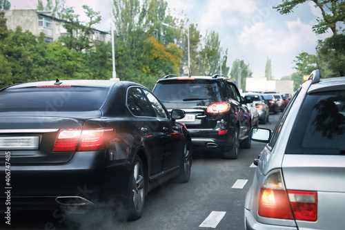 Cars in traffic jam on city street