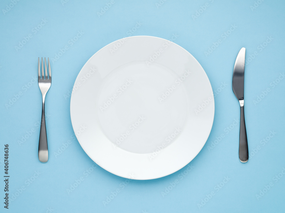 empty white plate blue  background