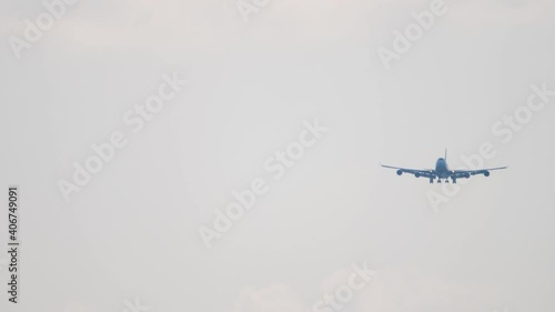 Widebody airliner on final approach before landing photo