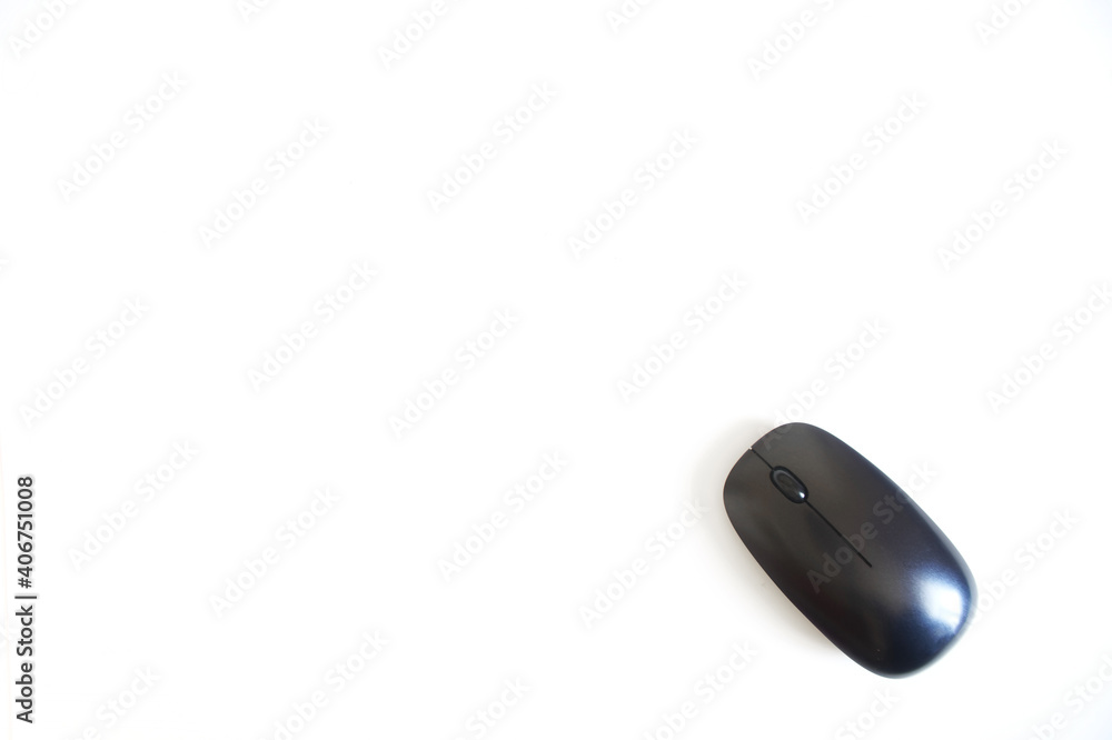 Black wireless computer mouse on a white background. Black wireless computer mouse on a white background.