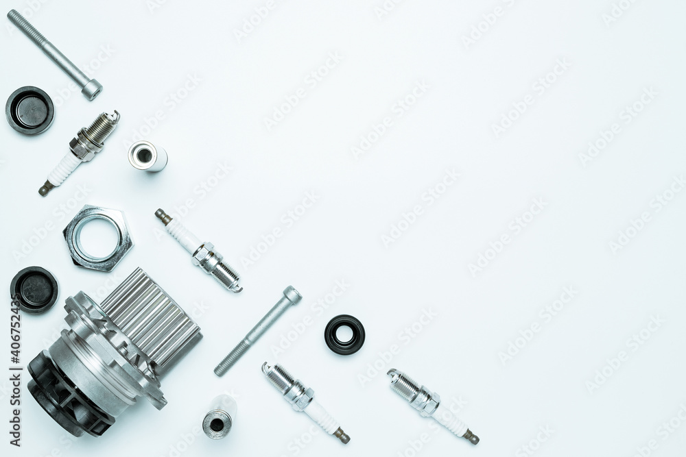 Auto valve. Motor mechanic spare or automotive piece isolated on white background. Set of new metal car part. Flat lay, top view, copy space. Auto valve. Motor mechanic spare or automotive piece isolated on white background. Set of new metal car part. Flat lay, top view, copy space.