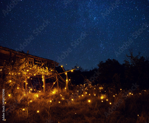 old traditional Bulgarian house at night under the Milky Way
