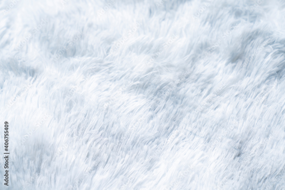 Obraz premium Close up white shaggy artificial fur texture or carpet for background.