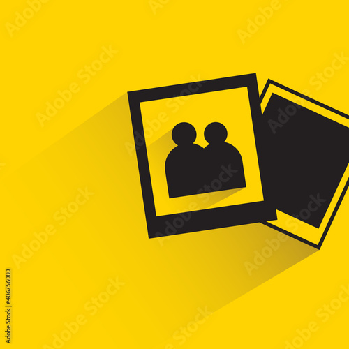 photo with shadow on yellow background