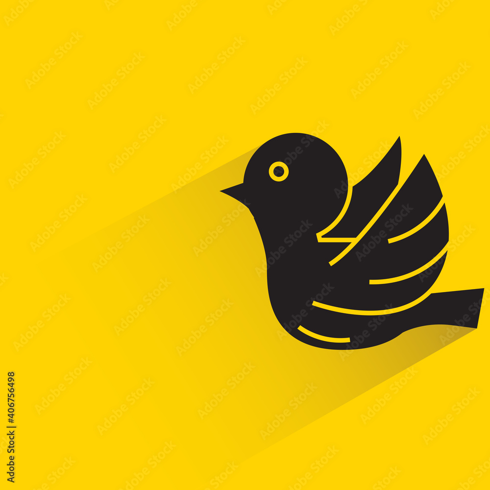 Obraz premium bird with shadow on yellow background