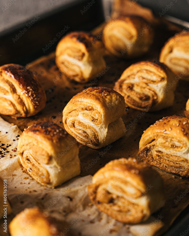|Close up peanut butter pastry rolls on baking sheet