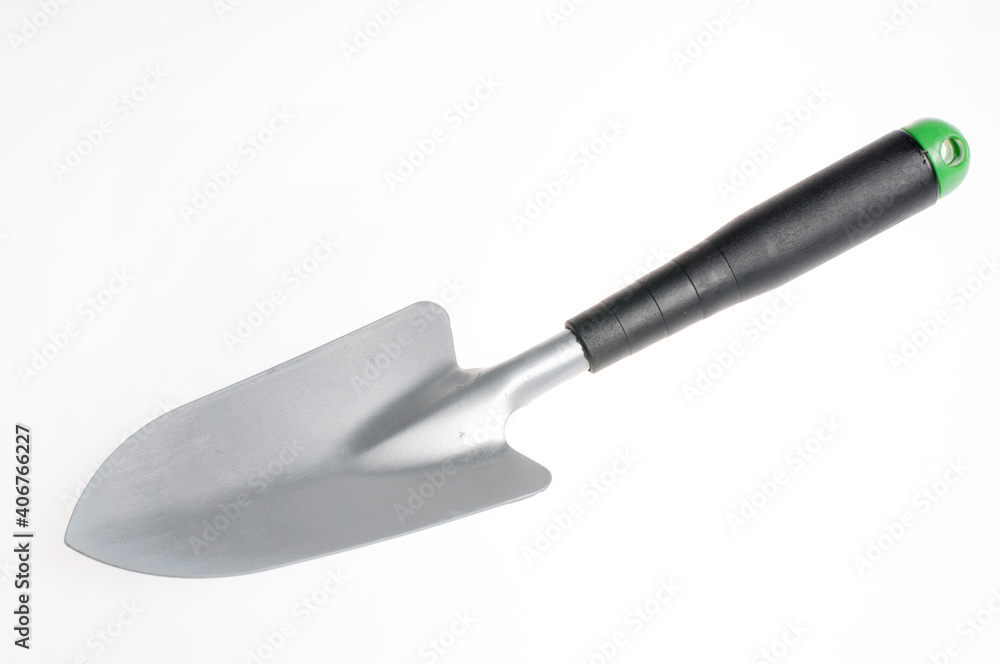 Garden tool shovel for planting flowers, made of metal and plastic Garden tool shovel for planting flowers, made of metal and plastic