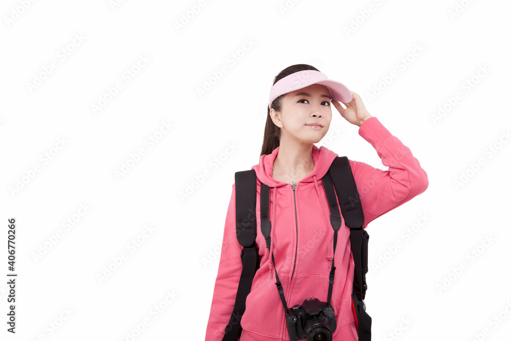 Portrait of young female with camera,carrying backpacker Portrait of young female with camera,carrying backpacker