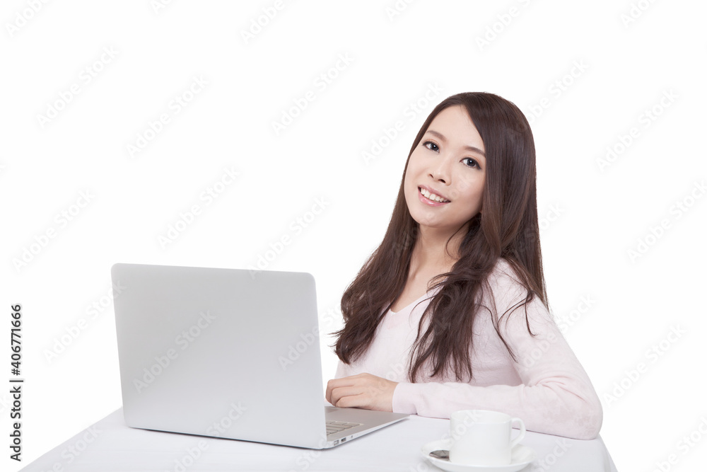 Portrait of young sitting in front of laptop Portrait of young sitting in front of laptop