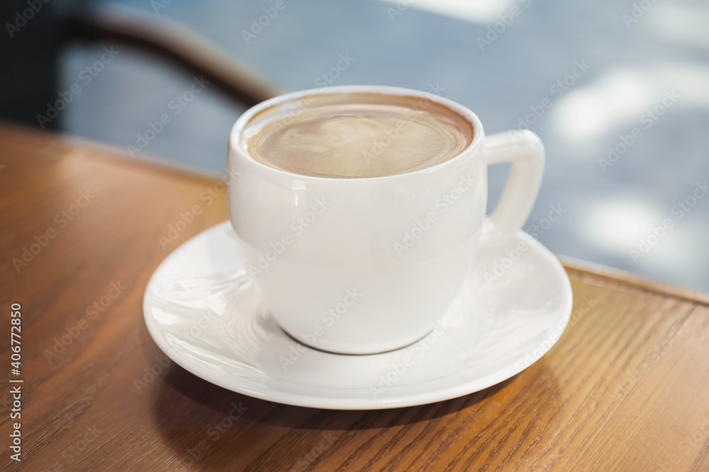Aromatic coffee on wooden table outdoors, closeup Aromatic coffee on wooden table outdoors, closeup