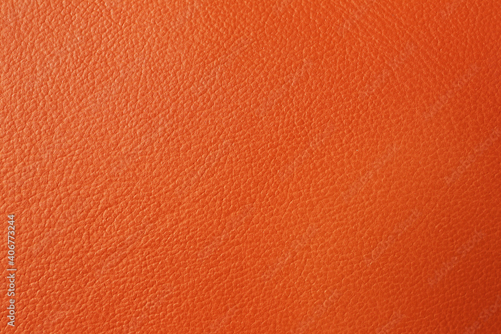 Texture of orange leather as background, closeup Texture of orange leather as background, closeup