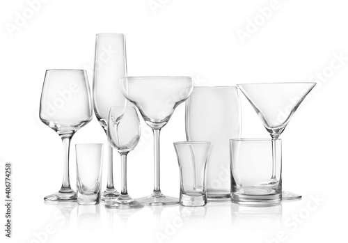 Set of new bar glassware on white background photo