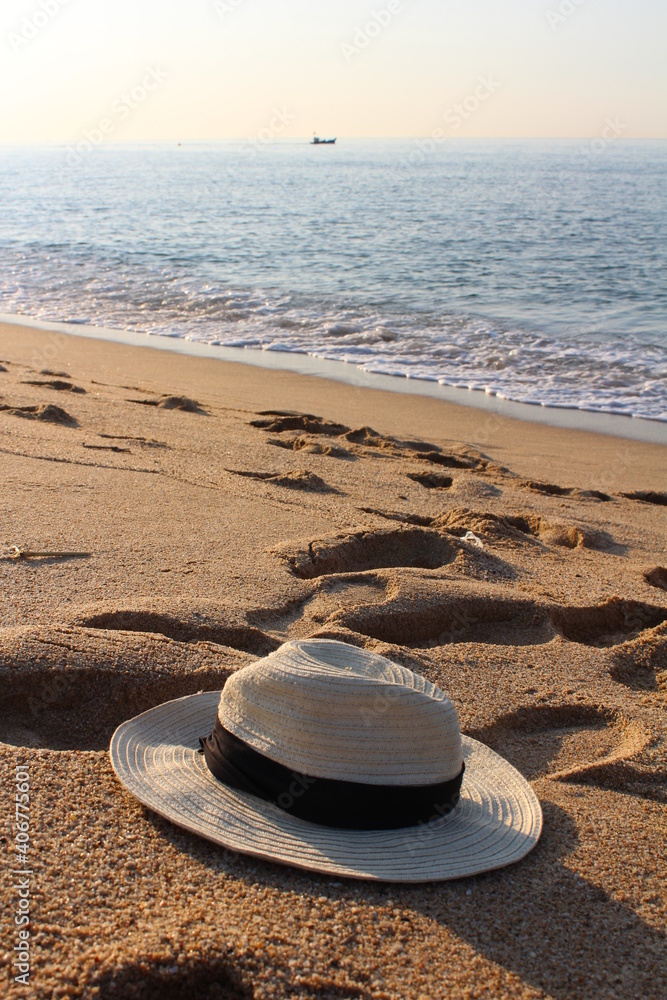 hat on the beach hat on the beach