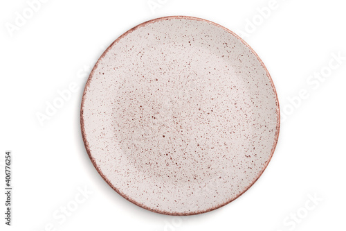 Fotografie, Tablou Empty pink dotted ceramic plate isolated on white background