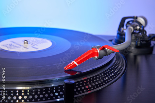 Retro vinyl record player close up shot turntable used by professional DJ