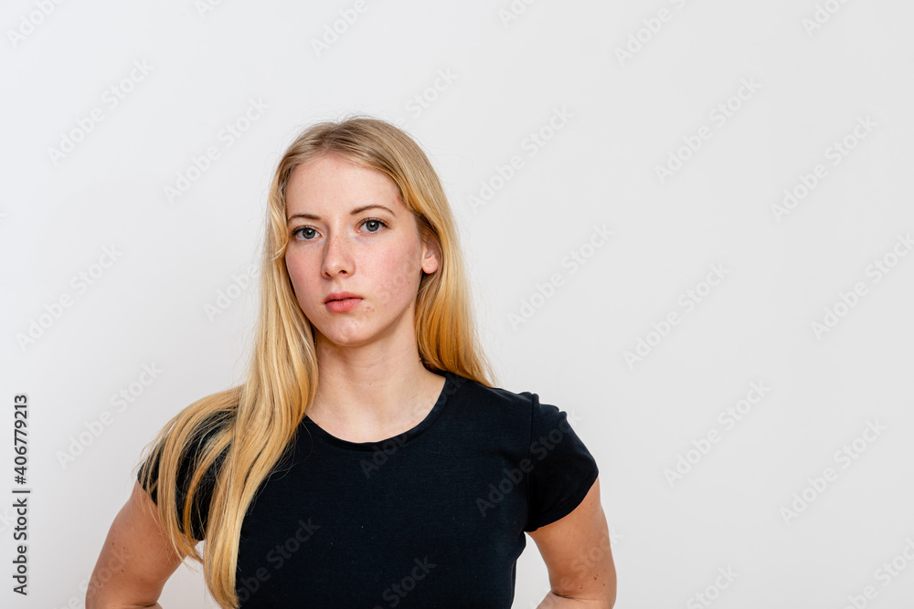 portrait of a young blonde female isolated on a white background portrait of a young blonde female isolated on a white background