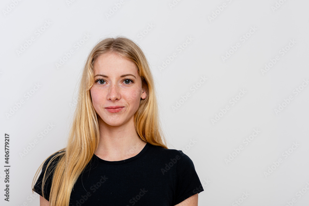 portrait of a young blonde female isolated on a white background portrait of a young blonde female isolated on a white background