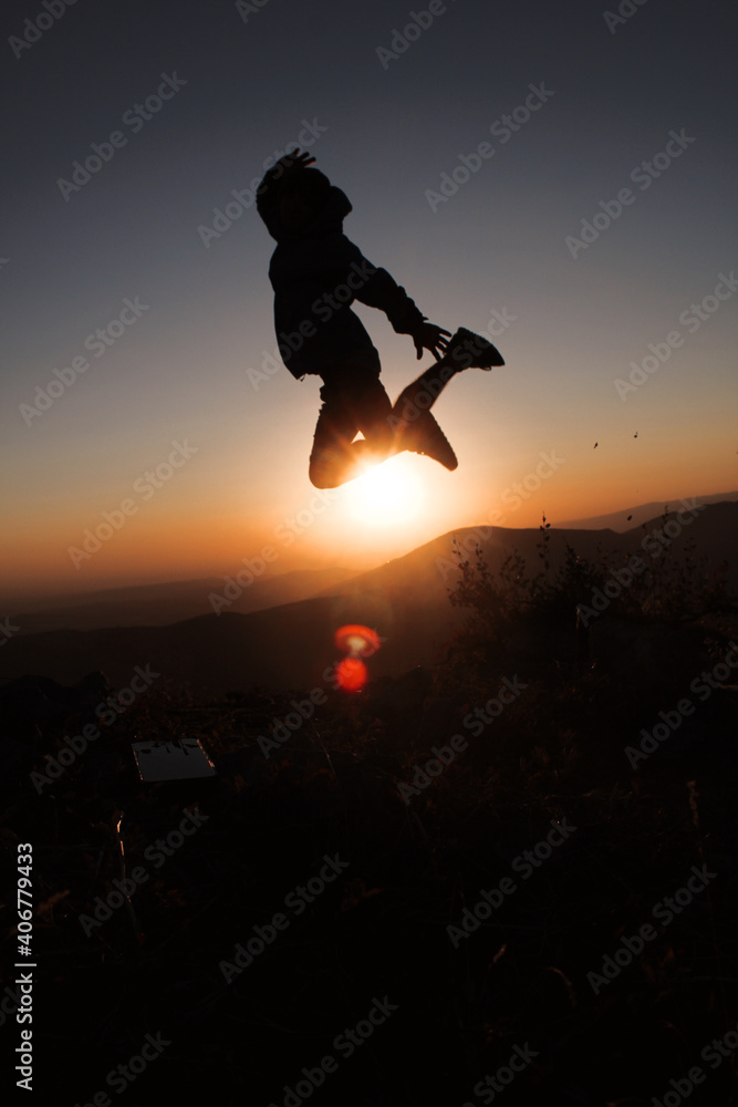 silhouette of jumping person