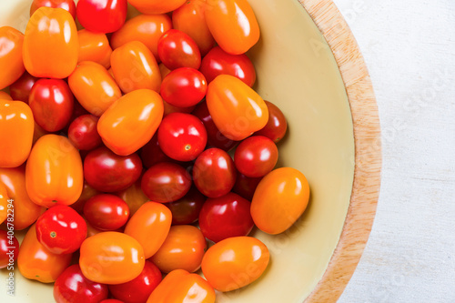 Cherry tomatoes on the white background