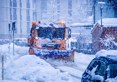 truck cleaning the streets in winter