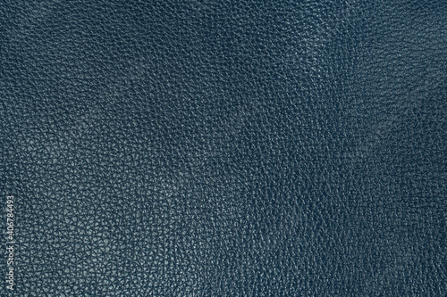 Dark blue real or genuine leather texture for background. © Viktoria
