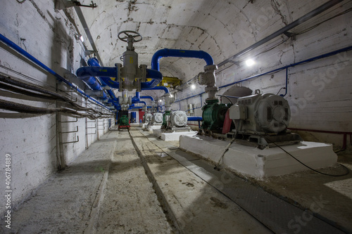 Underground gold mine water pumping station room with pumpsets