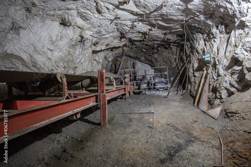 Underground gold mine shaft tunnel with ore transporter