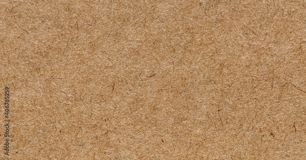 Kraft packaging paper texture, macro shot. Sharp and detailed surface. Blank brown paper. Kraft packaging paper texture, macro shot. Sharp and detailed surface. Blank brown paper.