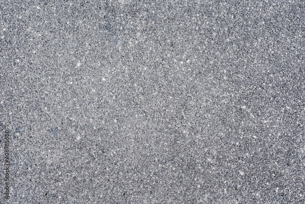 The texture of the gray asphalt pavement. Asphalt empty space. The texture of the gray asphalt pavement. Asphalt empty space.