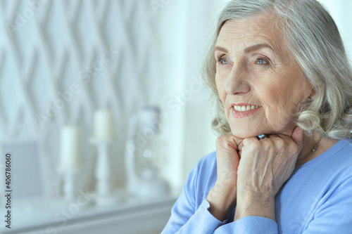 portrait of beautiful senior woman posing at home