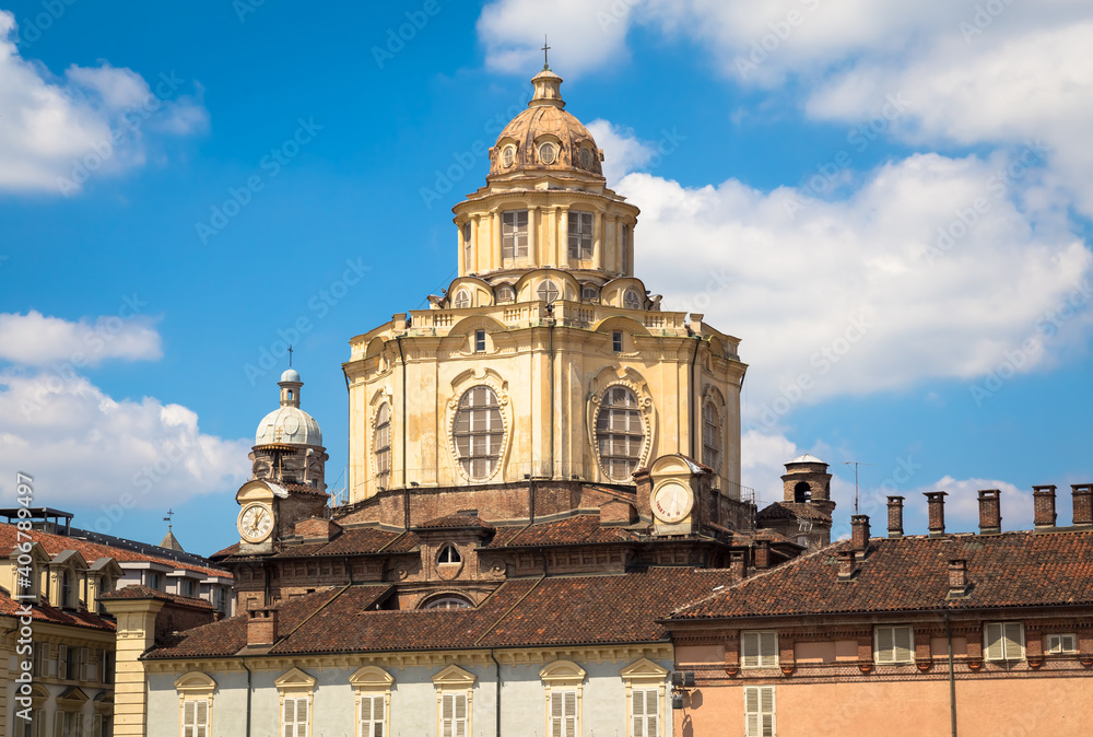 Perspective on the elegant Saint Lawrence church in Turin with a blue sky