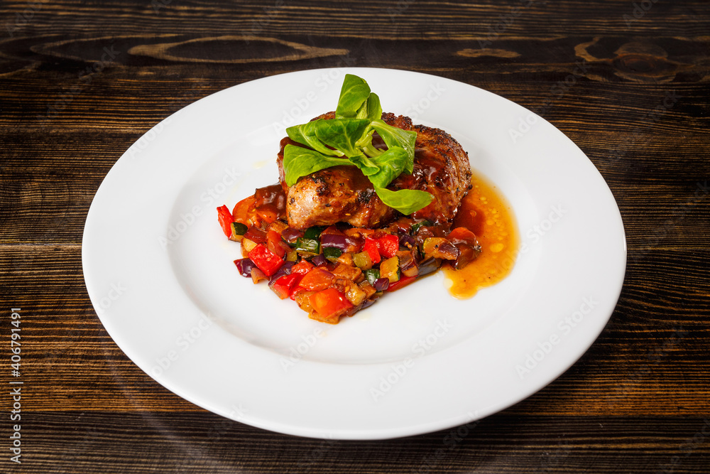 Juicy piece of meat with stewed vegetables Juicy piece of meat with stewed vegetables