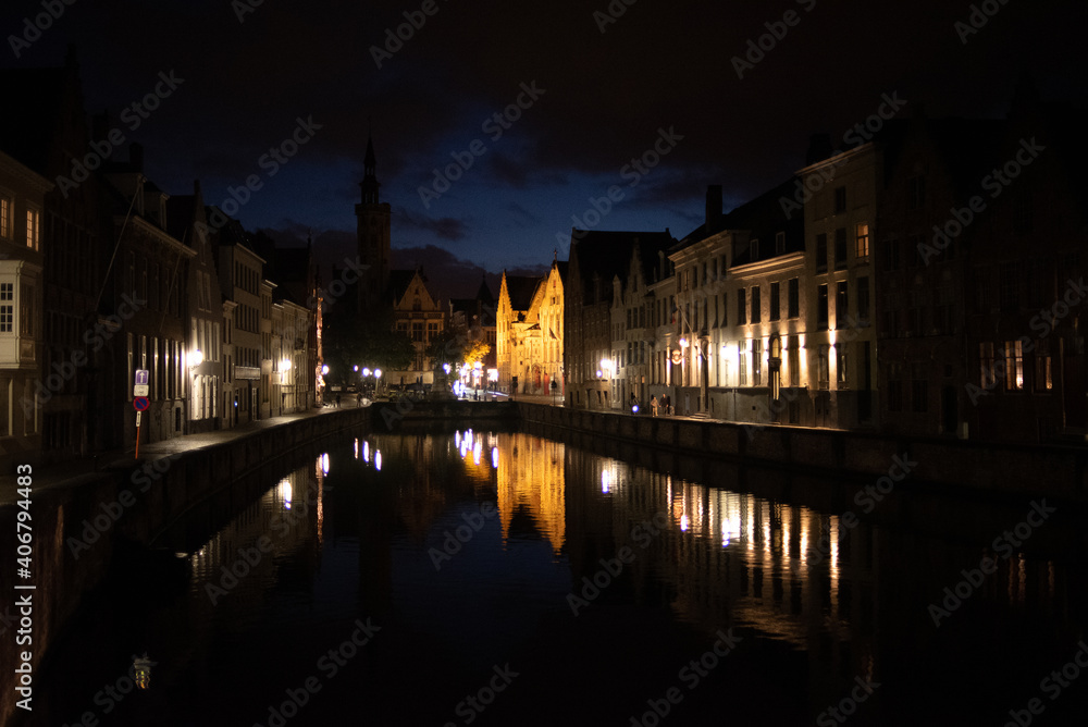 Bruges, Belgium - October 04, 2019: Bridge and building by the river