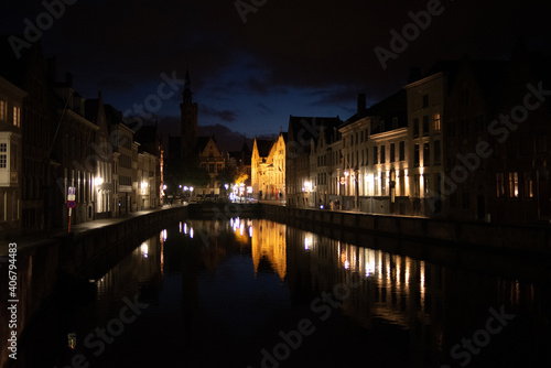 Bruges, Belgium - October 04, 2019: Bridge and building by the river