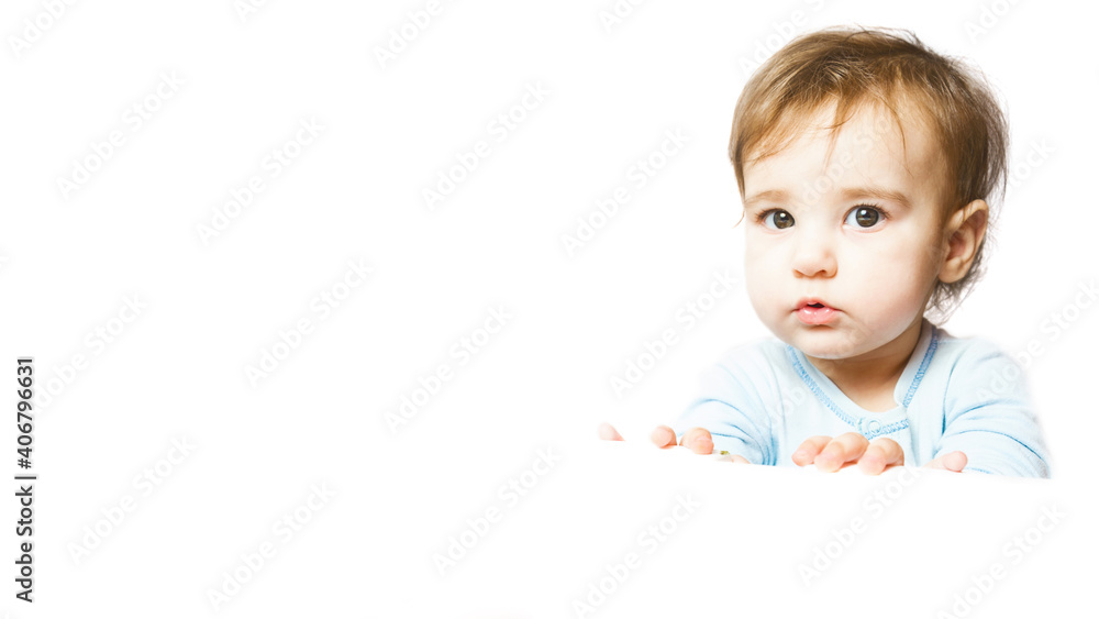 The baby is 8 months old. Portrait of a cute toddler on a white background with copy space The baby is 8 months old. Portrait of a cute toddler on a white background with copy space