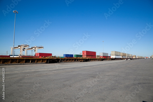 Canvas Print Rail yard with containers loaded onto train