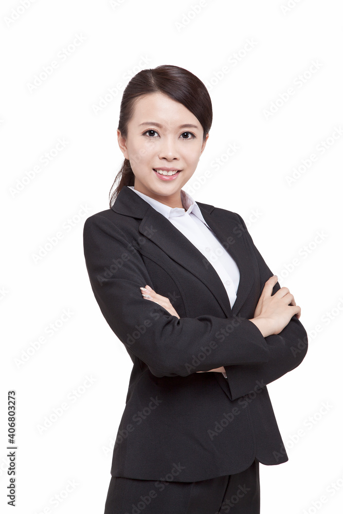 Portrait of young businesswoman standing folding arms Portrait of young businesswoman standing folding arms