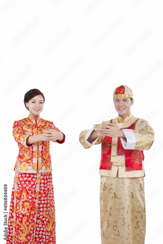 Portrait of young couple in Tang suits paying New Year call Portrait of young couple in Tang suits paying New Year call