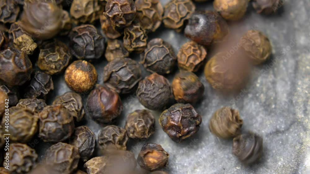 Black Peppercorns Falling into Kitchen Mortar Slow Motion Black Peppercorns Falling into Kitchen Mortar Slow Motion