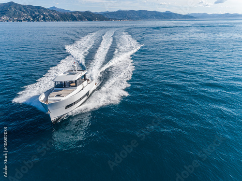 motor yacht in navigation aerial view © Andrea