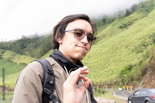 young man making ok sign with hand
