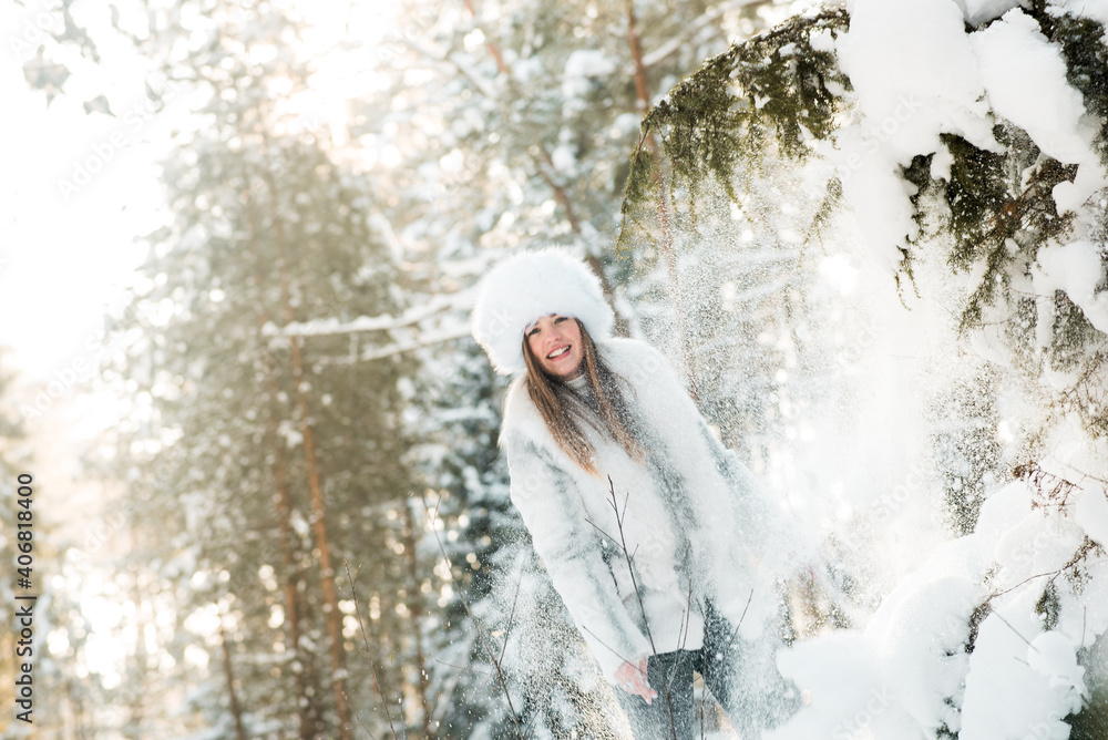 Portrait of young woman in the frosty winter forest Portrait of young woman in the frosty winter forest