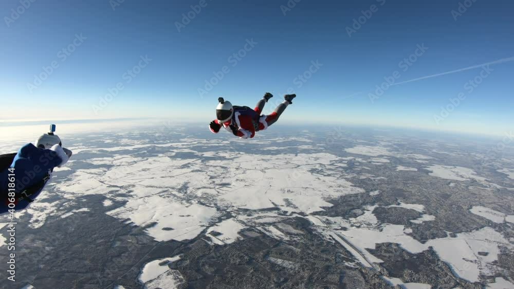 Skydiving. Fun jump. Two skydivers are having fun in the sky. Skydiving. Fun jump. Two skydivers are having fun in the sky.