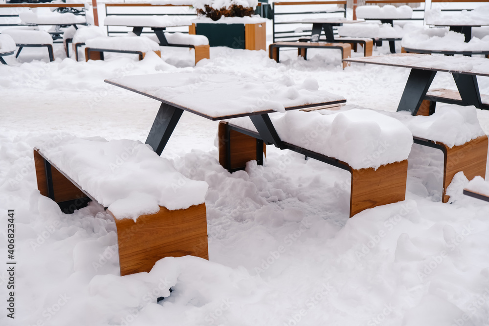 custom made wallpaper toronto digitalTables and benches of outdoor cafes, covered with snow.
