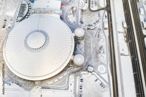 Top view in winter of a modern sports complex with parking in Minsk. Belarus photo