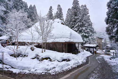 snow covered house in winter