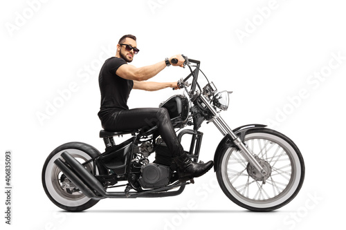 Fotótapéta Man with sunglasses riding a chopper motorbike