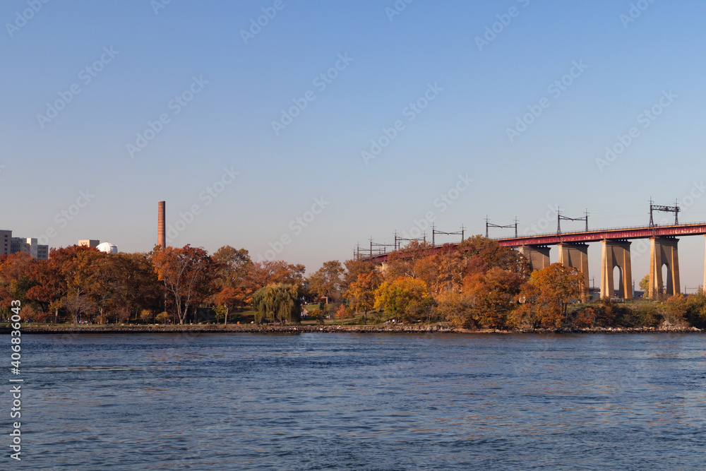 Colorful Trees along the Shore of Randalls and Wards Islands during Autumn in New York City