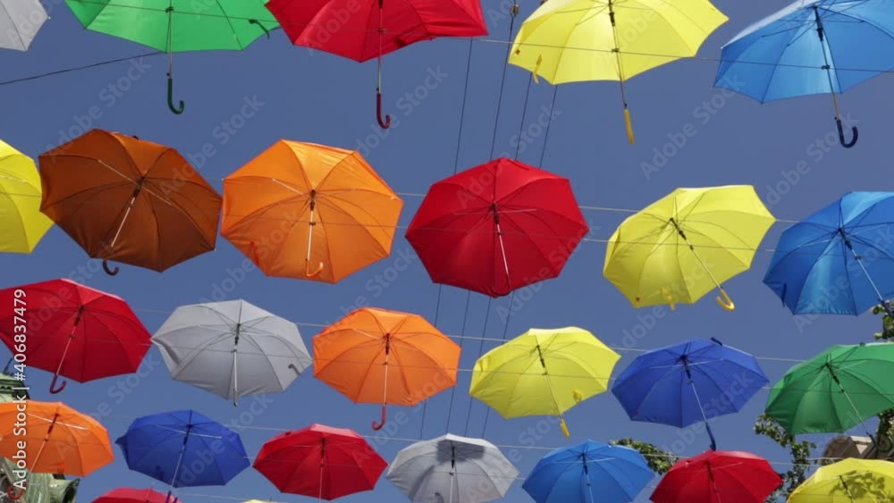 Collection of colorful umbrellas on sky background Collection of colorful umbrellas on sky background
